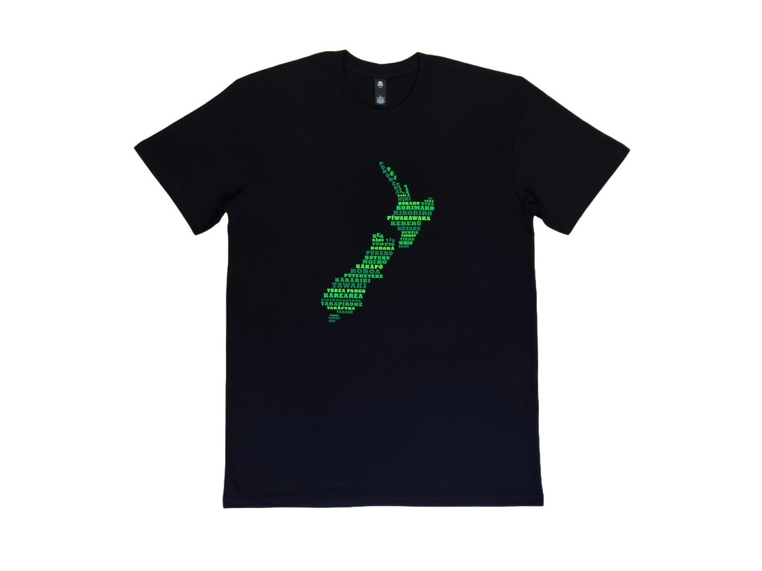 A black men's tee shirt, featuring the names of native birds, creating a map of new zealand, printed in green eco friendly inks.