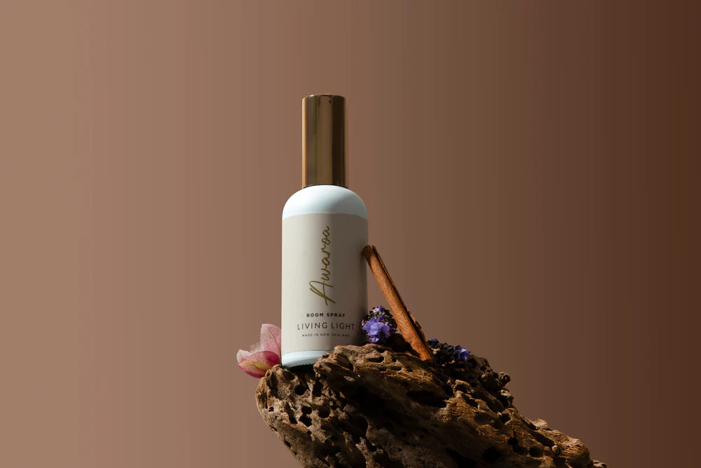 Awaroa oriental scented room spray fragrance, presented in a white glass bottle, with gold cap. Made in New Zealand by Living light.